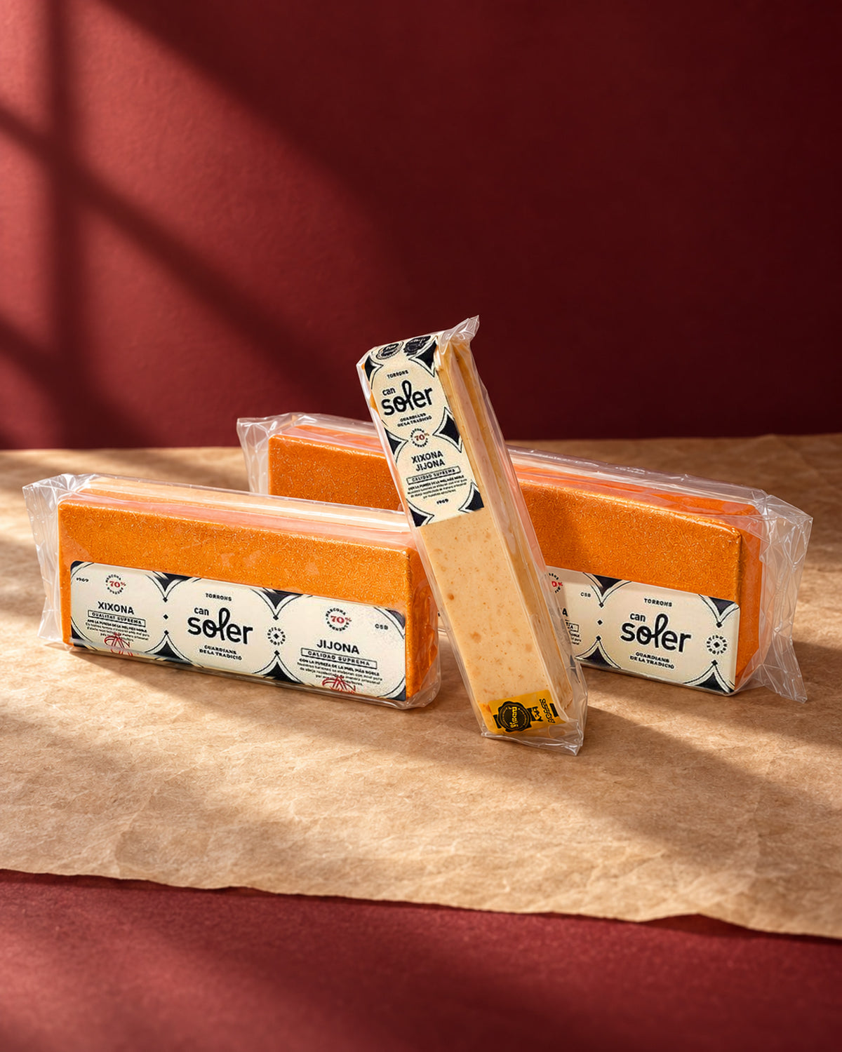 Dos envases de turrón de Jijona D.O. Jijona de Can Soler y una barra individual